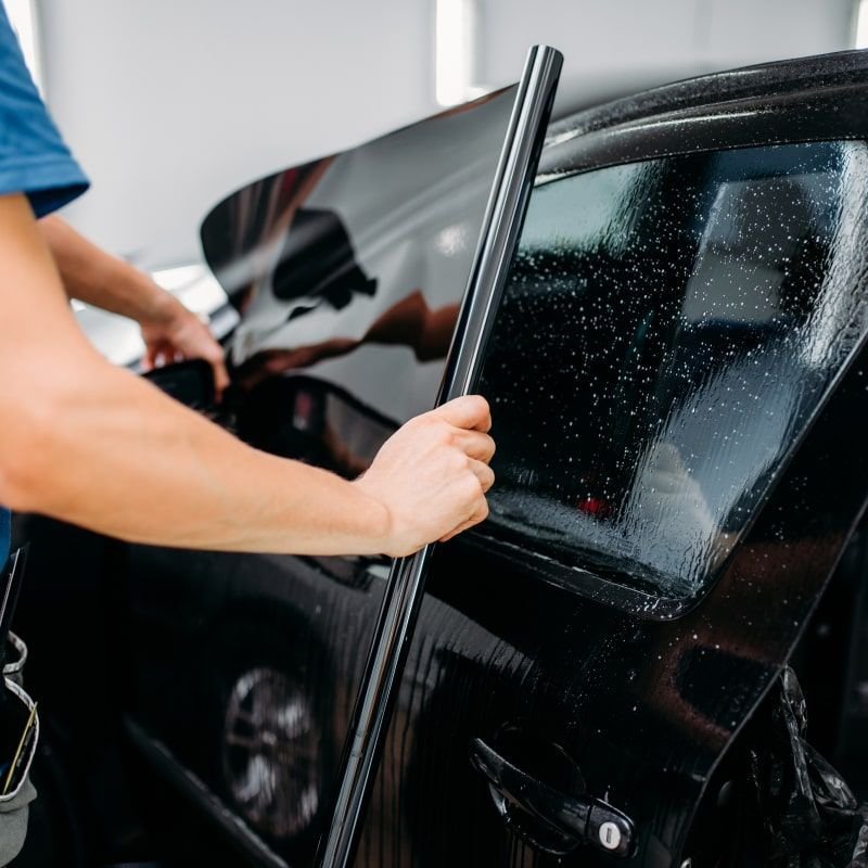 Automotive window tinting